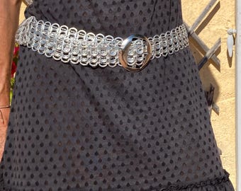 Belt made from recycled can capsules