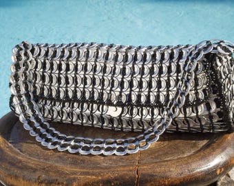 Handbag made from recycled can capsules