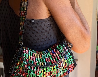 Handbag made from recycled can capsules
