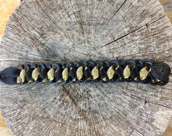 Bracelet made from recycled can capsules