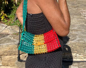 Handbag or shoulder bag made from recycled can capsules