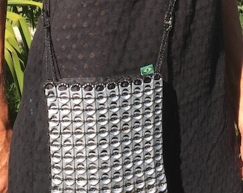 Pouch made from recycled can capsules