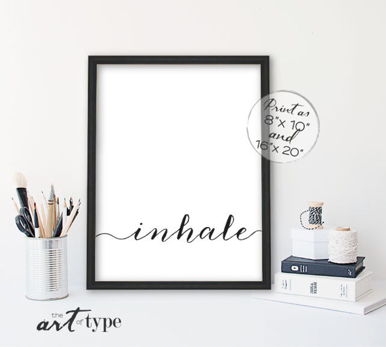 May include: Black and white printable wall art featuring the word "inhale" in a cursive font. The print is available in 8x10 inches and 16x20 inches.