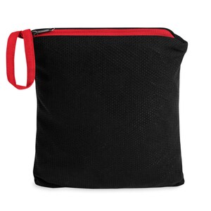 May include: Black drawstring bag with a red zipper and red trim. The bag is made of a mesh material.