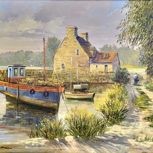 May include: Oil painting of a coastal scene featuring a blue and red fishing boat docked near a stone building. A smaller sailboat is moored nearby. A person walks along a path beside the water, with yellow flowers in the foreground.