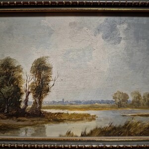 Charming German oil landscape signed and painted on panel, perfect for collectors of European fine art and fans of vintage rustic decor. The soft light, warm color palette, and classic proportions suit country homes, cabins, or traditional living rooms. Ideal for art collectors and decorators alike, this artwork also makes a memorable gift for family gatherings, weddings, or Christmas, especially for those who appreciate vintage oil paintings.