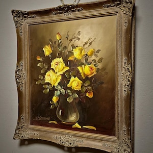 An elegant mid century floral artwork depicting yellow rose arrangement in glass vase, rendered with soft tonal transitions and natural depth, embodying European fine art aesthetics, ideal for French country decor, dark academia interior styling, or refined home decoration concepts, attractive to collectors searching for original paintings, flower bouquet art, and meaningful gift ideas for friends, relatives, or art enthusiasts