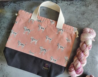 Medium knitting or crochet project bag with interior pocket. Simple bag with handles and drawstring closure. Modern handmade bag.