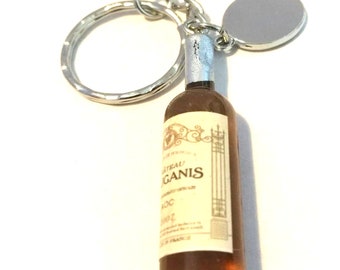 Personalised yellow bottle wine keyring in velvet gift pouch PL483
