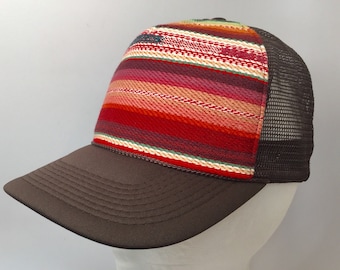 Yarn dyed beautiful cotton woven stripe on chocolate brown trucker cap. Great unisex cap