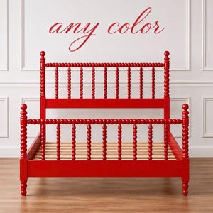May include: A bright red bed frame featuring a headboard and footboard constructed with vertical spindles that have a repeating spherical, beaded design. The text "any color" is written in a red cursive script above the bed frame.
