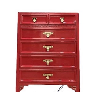May include: A red wooden chest of drawers with six drawers and gold-colored hardware. The chest has a glossy finish and a traditional design. The text "any color" is written at the bottom of the image.