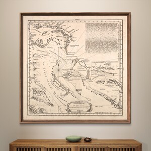 Puede incluir: Un mapa antiguo de las Bahamas, impreso en blanco y negro, con el t&iacute;tulo "Carta Rectificada De Las Islas Lucayos o de Los Lucayos" y la fecha "Santa Barbara De Las Indias, 1744".