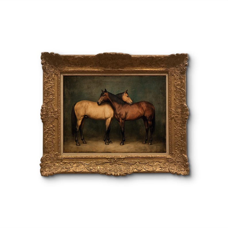 May include: An antique painting in a gold ornate frame depicts two horses. One horse is a light tan color, and the other is a dark brown. They are standing close together, with their heads touching. The background is a dark green color.