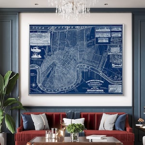 May include: A vintage blueprint style map of New Orleans, Louisiana, printed on a dark blue background. The map shows the city's streets, waterways, and landmarks. The text "Exposition 1884-1885 New Orleans La. U.S.A." is printed at the top of the map.