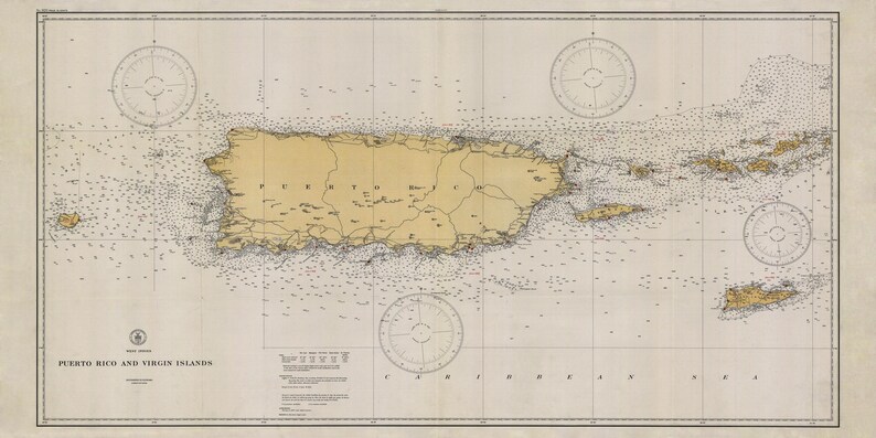 May include: A vintage nautical chart of Puerto Rico and the Virgin Islands. The map is printed on cream-colored paper with brown and blue lines. The map shows the islands' coastlines, major cities, and surrounding waters.