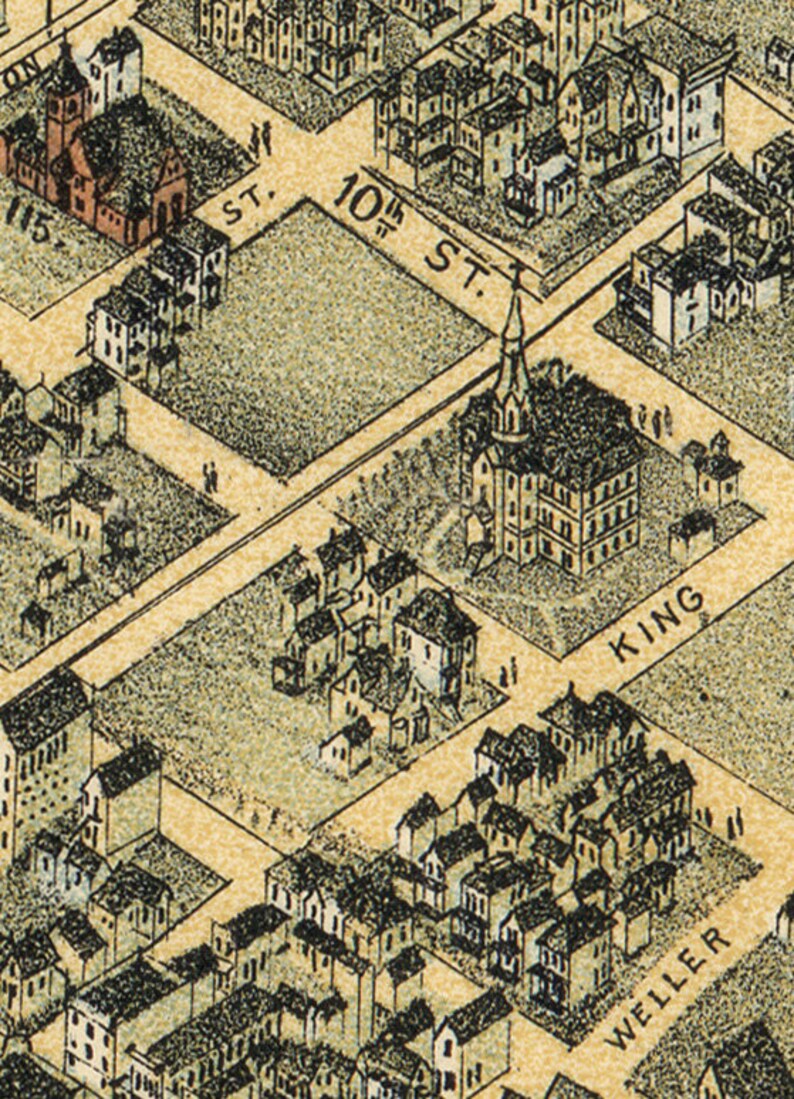 May include: An aerial view of a city block with a church in the center. The church has a tall steeple and is surrounded by houses. The street names "10th St." and "King" are visible.
