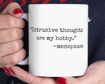 May include: White ceramic mug with black text that reads "Intrusive thoughts are my hobby." -menopause
