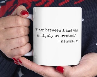 May include: White coffee mug with black text that reads "Sleep between 1 and 4am is highly overrated." -menopause