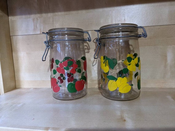 Lovely pair of fruit pattern glass storage jar