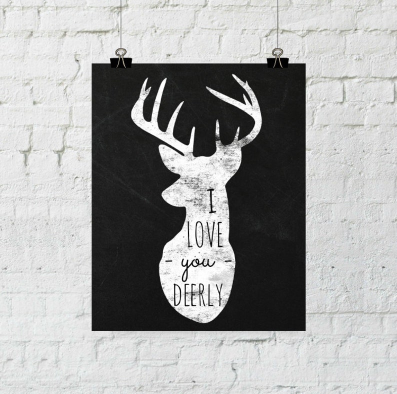 May include: Black and white poster with a silhouette of a deer head and the text "I love you deerly".
