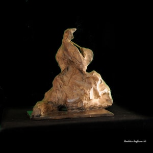 Joueur de flùte - metal sculpture bronze by Roberto Tagliazucchi