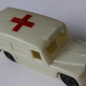 Vintage Red Cross Ambulance Truck Plastic NFIC Antique White Bus antique toy truck red cross