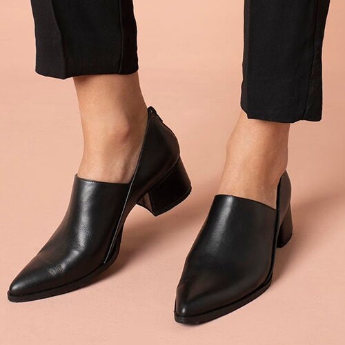 black slip on pointed shoes