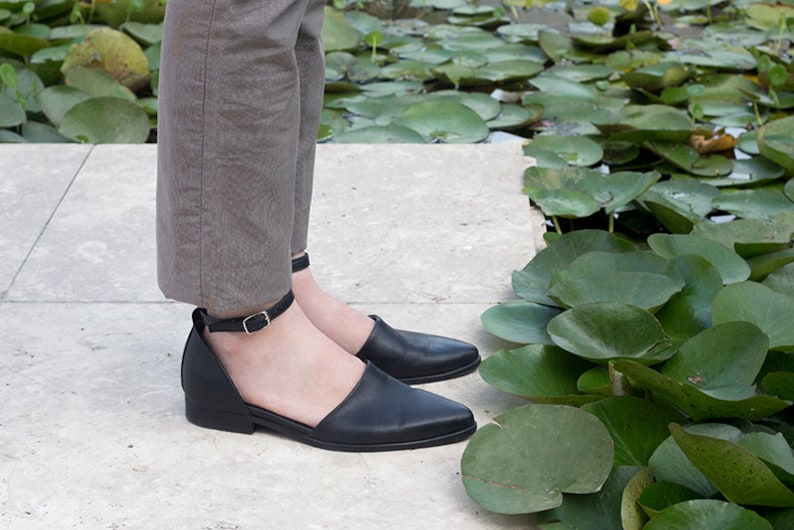 flat closed toe sandals with ankle strap
