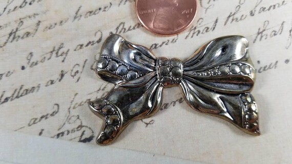 Nickel Bow Tie Metal Stamping