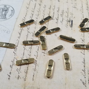 Floating Bandaid Charms pack of 18