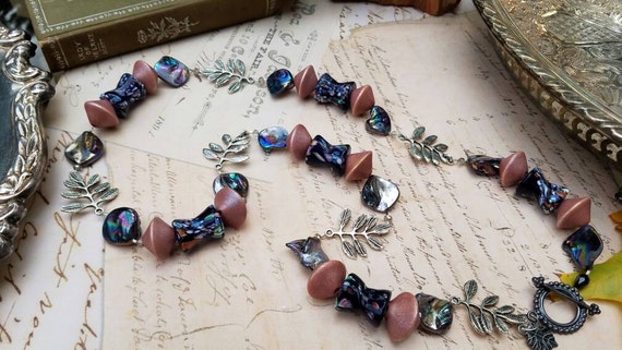 Ferns of the Wood Gypsy Boho Necklace Black Mother of Pearl, Art Glass, & Wood Beads and Silver Toned Fern Leaves