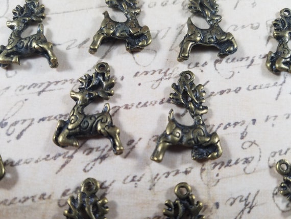 Reindeer Charms pack of 10, Deer Charms, Brass Reindeer Charms, Hunting Charms, Christmas Charm Findings