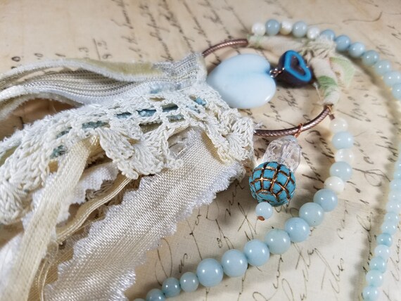 Shabby Chic Tassel Pendant Necklace; Antique Lace and Textiles Tassel Necklace; Pastel Blue and Cream Heart Tassel Pendant; Fiber Art Tassel