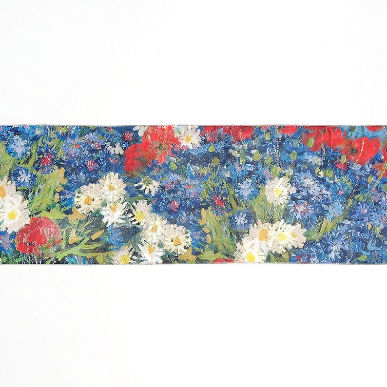 May include: A close-up of a painting of a bouquet of flowers. The flowers are mostly blue and white, with some red accents. The painting is done in a style reminiscent of Vincent van Gogh.