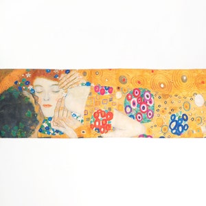 May include: A painting of a couple embracing, with the woman's head resting on the man's shoulder. The background is a vibrant yellow with a pattern of circles and squares. The woman has red hair and closed eyes, while the man's face is obscured by shadows. The painting is in a style reminiscent of Gustav Klimt.