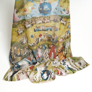 May include: A silk scarf with a colorful print of The Garden of Earthly Delights by Hieronymus Bosch. The print features a variety of figures, animals, and plants in a fantastical setting.