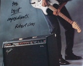 Robert Cray plays the Blues on a Fender Stratocaster guitar 1986 photo print Advertisement
