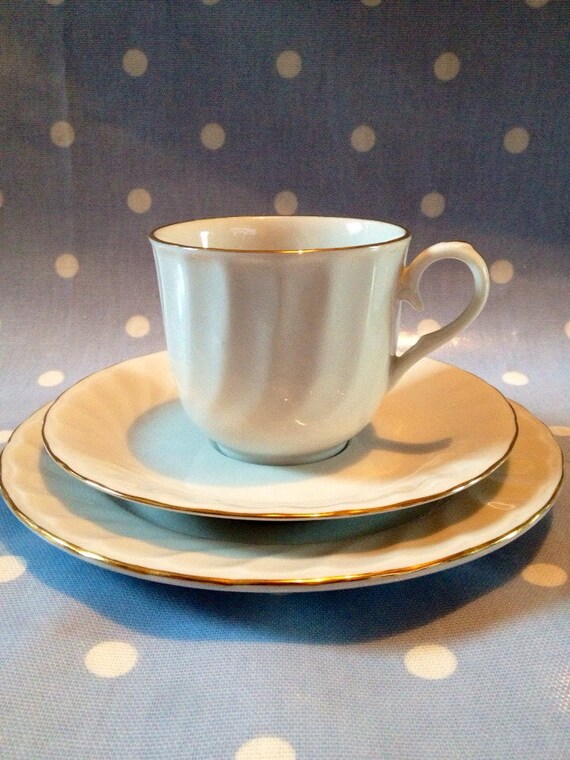 Items similar to White Tea cup saucer and side plate on Etsy