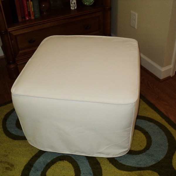 Custom made slipcover for your ottoman from your own fabric.  This one is Pottery Barn's dream nursery ottoman.