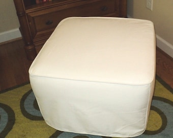Custom made slipcover for your ottoman from your own fabric.  This one is made to fit Pottery Barn cube companion ottoman