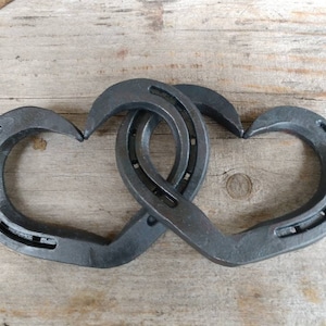 Intertwined Horseshoe Hearts - hanging wall or decor