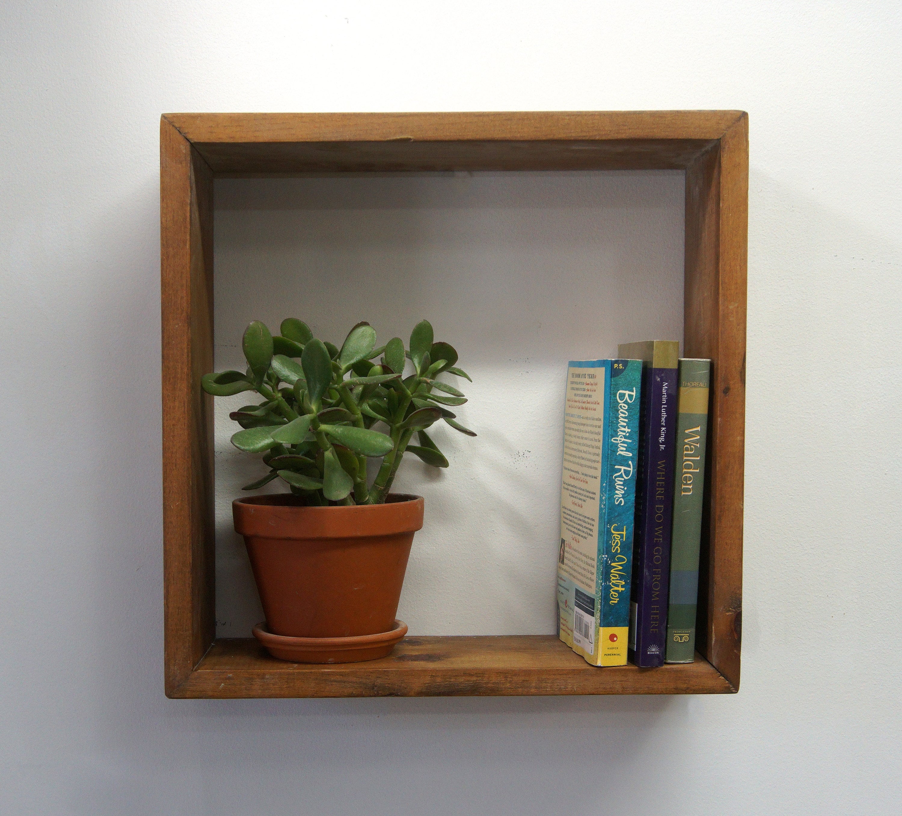 Square on sale bookshelf wall