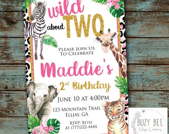 May include: A pink and gold birthday invitation with a jungle theme. The invitation features a zebra, giraffe, elephant, and tiger. The text on the invitation reads "Wild About Two" and "Maddie's 2nd Birthday".