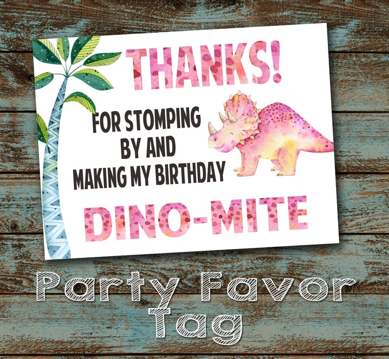 May include: Pink dinosaur party favor tag with the text "THANKS! FOR STOMPING BY AND MAKING MY BIRTHDAY DINO-MITE" and the words "Party Favor Tag" written in white chalk.