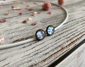 Romantic stud earrings with blue flowers in copper setting