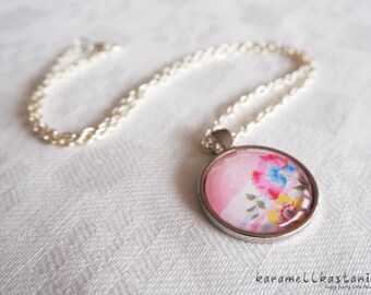 Necklace with pendant pink flowers, silver-colored frame