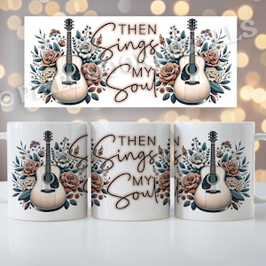 Op de afbeelding: Witte keramische mok met een bloemenpatroon en een gitaar met de tekst "Then Sings My Soul" aan de voorkant.