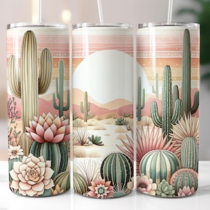 May include: Three stainless steel tumblers with a desert cactus design. The tumblers feature a pink and orange sunset with green cacti and succulents.