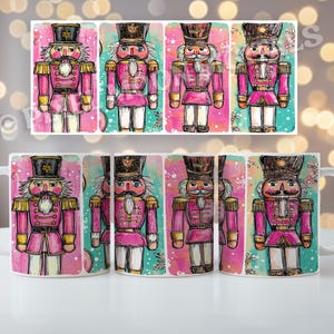 May include: A white ceramic mug with a repeating pattern of a watercolor-style nutcracker soldier in a pink uniform with gold accents. The background is a mix of pink and teal colours. A matching design is on a rectangular coaster.
